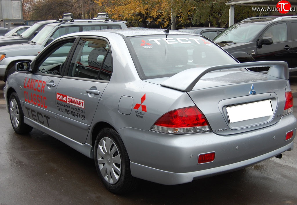 4 249 р. Накладка заднего бампера GT Dynamics Mitsubishi Lancer 9 1-ый рестайлинг седан (2003-2005) (Неокрашенная)  с доставкой в г. Владивосток