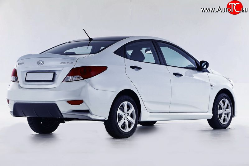 14 499 р. Задний бампер Sport  Hyundai Solaris  RBr (2010-2014) седан дорестайлинг (Неокрашенный)  с доставкой в г. Владивосток