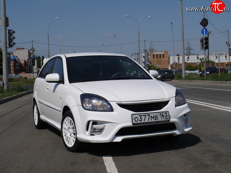 10 999 р. Передний бампер Vita Dm  KIA Rio ( 2 JB,  4 FB) (2005-2024) дорестайлинг седан, дорестайлинг, хэтчбэк 5 дв., рестайлинг, хэтчбэк 5 дв., рестайлинг седан (Без сетки, Неокрашенный)  с доставкой в г. Владивосток