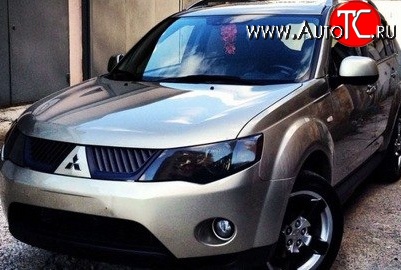 1 529 р. Темная защита передних фар SIM Mitsubishi Outlander XL (CW)  дорестайлинг (2005-2009)  с доставкой в г. Владивосток