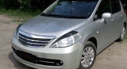 Реснички RA на фары Nissan (Нисан) Tiida (Тиида) ( 1 хэтчбэк,  1 седан,  1 хэтчбек) (2004-2014) 1 хэтчбэк, 1 седан, 1 хэтчбек C11 дорестайлинг, Япония, C11 дорестайлинг, C11 рестайлинг, C11 рестайлинг