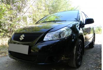 2 899 р. Защита радиатора Стрелка11 Стандарт  Suzuki SX4  GYC21S (2006-2012) дорестайлинг седан (черная)  с доставкой в г. Владивосток. Увеличить фотографию 2