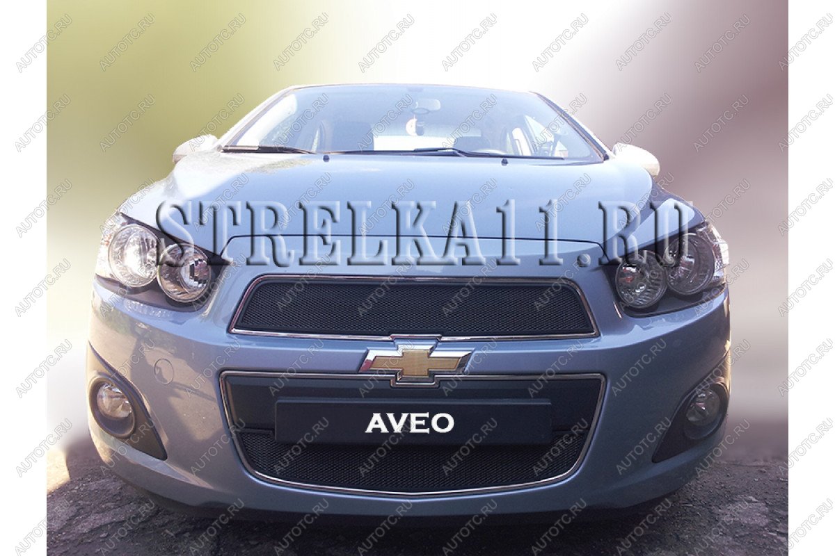 799 р. Зимняя заглушка решетки радиатора (верх) Стрелка11  Chevrolet Aveo  T300 (2011-2015) седан, хэтчбек (черная)  с доставкой в г. Владивосток